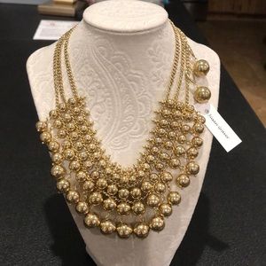 Susan Graver gold tone ball bib necklace.